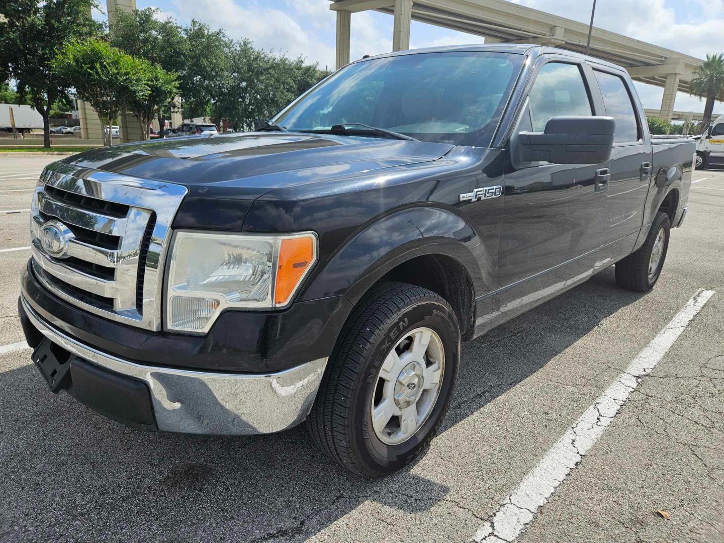 2009 Black Ford F-150 (1FTRW12829F) , located at 5005 Telephone Rd., Houston, TX, 77087, (713) 641-0980, 29.690666, -95.298683 - Photo#0